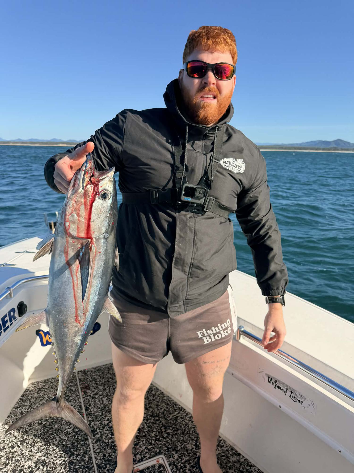 Angler holding a tuna caught on a Classic-style fishing trip